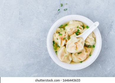 Wonton Soup Bowl. Shrimp Or Pork Wonton Soup With Green Onion, Top View, Copy Space