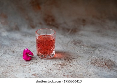 Woo Woo cocktail on a gray background