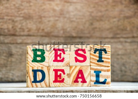 Wood alphabet stack in wording best deal background