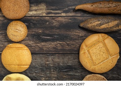 Wood Background of assorted breads from above. Bakery food. Healthy food concept. flat lay