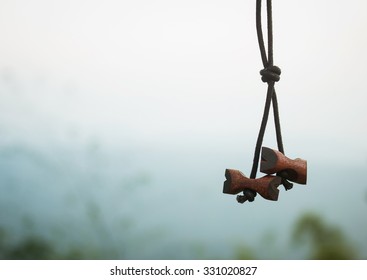 Wood Badge Sign Hanging On Mountain View Background 