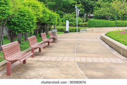 wood bench in line in the public park