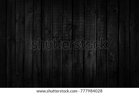 Wood black and white texture. Close-up of a wooden fence. Abstract texture and background for designers.