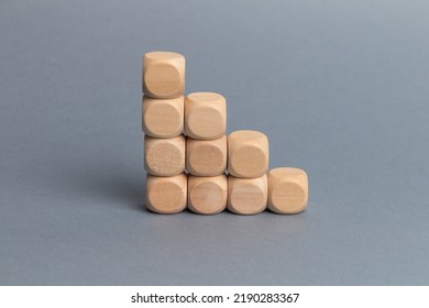 Wood Block Step Stair Of Pyramid On Gray Background. Business Concept For Growth Success Process. Slide For Presentation. Steps. Minimalism. Simple Shapes Geometry. Blank Space For Your Text.