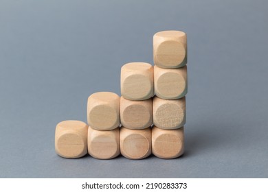 Wood Block Step Stair Of Pyramid On Gray Background. Business Concept For Growth Success Process. Slide For Presentation. Steps. Minimalism. Simple Shapes Geometry. Blank Space For Your Text.