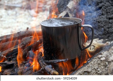 Wood And Boiling Water In Big Campfire