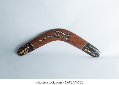 A Wood Boomerang On White Background