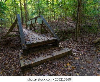 Wood Bridge In The Forest Near Falls Lake In North Carolina