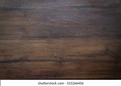 wood brown grain texture, dark wall background, top view of wooden table - Shutterstock ID 315266456
