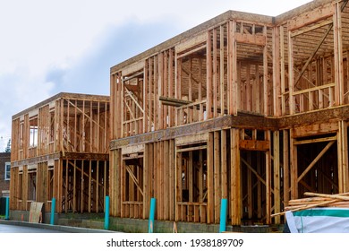 Wood Building Frame Structure On A New Development Framing Of New House Under Construction