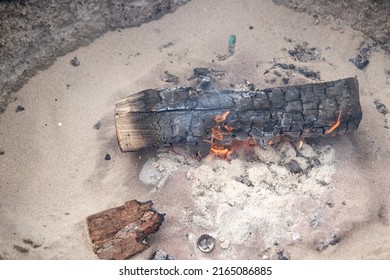 Wood Burning  In The Fire Ring At The Beach. B.B.Q In The Fire Pit.