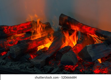 Wood Burning In The Fireplace Closeup. Home