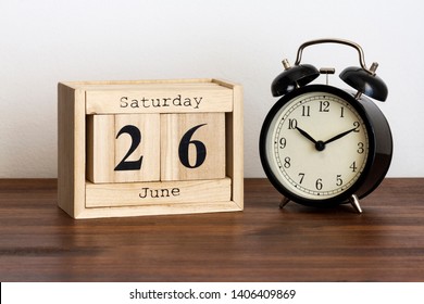 Wood Calendar With Date And Old Clock. Saturday 26 June