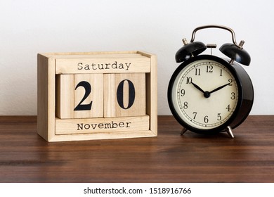 Wood Calendar With Date And Old Clock. Saturday 20 November