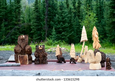 Wood Carved Bears And Trees In Cooper Landing Alaska