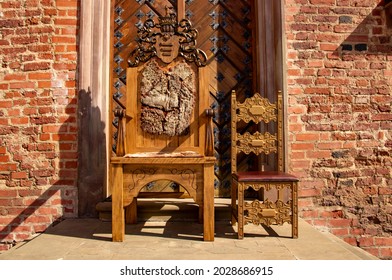 Wood carved majestic royal throne chair. 15 August 2021, Baranovichi, Belarus