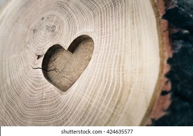 Wood carving, symbol of love, the heart. Background for your design