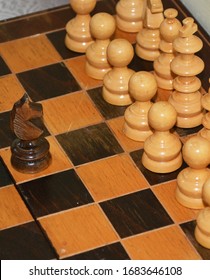 Wood Chess Pieces On Board Game