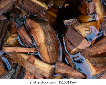 Wood Chips Soaking In Water For Smoking In BBQ