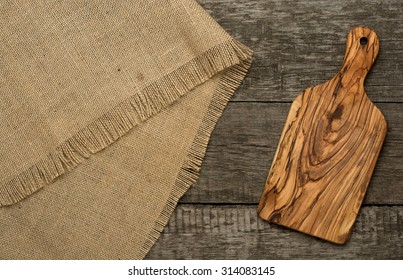 Wood Chopping Board On Wooden Background. Top View