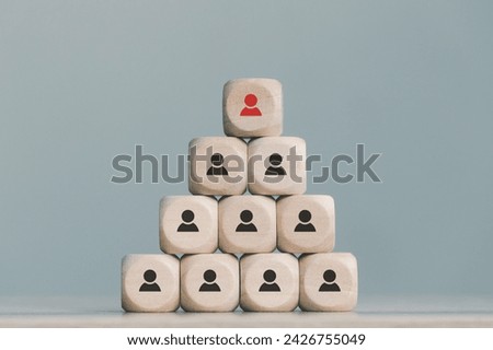 wood cube block with Organizational leader working as a team