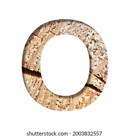 Wood Cut Font. The Letter O Cut Out Of Paper On The Background Of A Cut Of A Tree With Cracks And Shavings. Set Of Decorative Natural Alphabet Fonts.