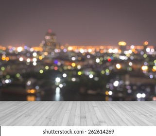 Wood Deck In Grey With Blurred Abstract Background Of Night Light Of Bangkok Cityscape On Chao Phraya Riverfront

