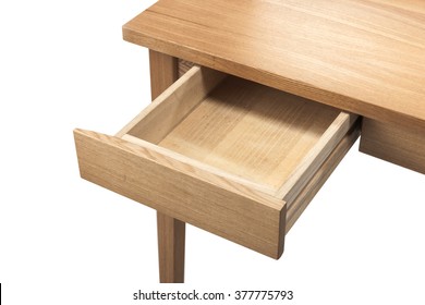 A wood desk(table) for cosmetic(hair, make up) with empty(blank, vacant, hollow) drawer.