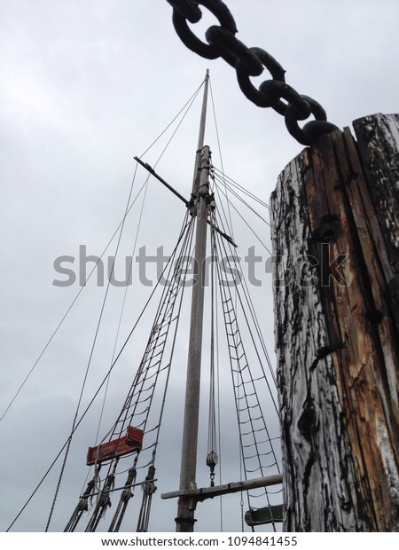 wood dock pole and ship\
mast