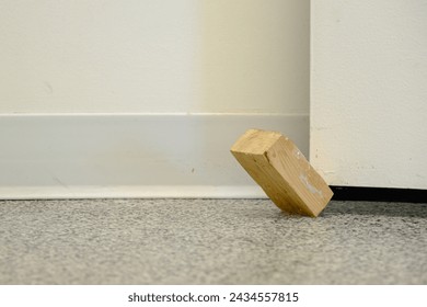 Wood Door Wedge hold a door open