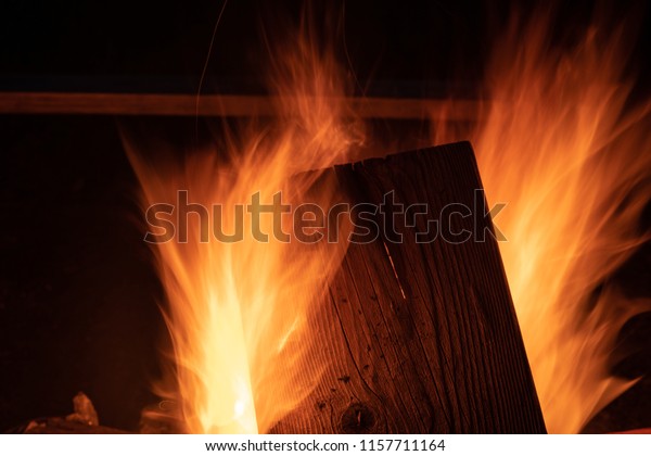 Wood Fire Blazes Fire Pit Family Stock Photo Edit Now 1157711164