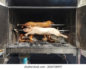 Wood Fire Oven With Porks Cooking Inside