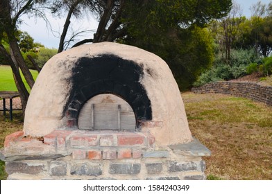 Wood Fired Pizza Oven In Garden Setting