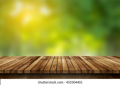 Wood floor with blurred trees of nature park background and summer season, product display montage - Shutterstock ID 455504401