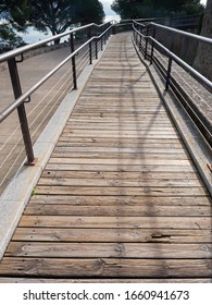 Wood Floor Of Bridge For Handicapped Visitors Of The Castle In Wheelchairs. Aged Wood Of Moat Protection Castle., Fiber.