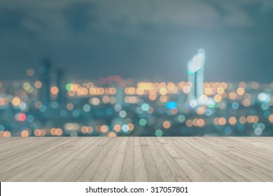 Wood Floor Terrace Or Wooden Table With Rooftop Party Blur Background Perspective View City Night Nightlife Light Bokeh 