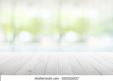 Wood flooring with glass office. atmosphere around office  blur background with bokeh. - Shutterstock ID 1023226327