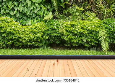 Wood flooring in a green plant garden decorative