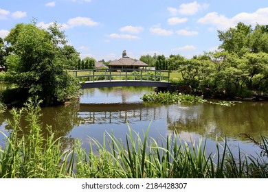 The Wood Footbridge In The Countryside On A Sunny Day.