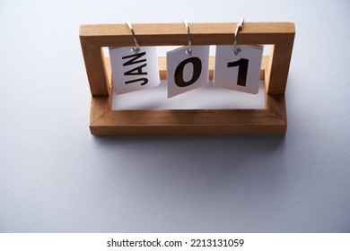 Wood Frame Modern Calendar Showing January 1st         