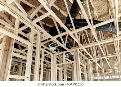 Wood Framed Home Showing Duct Work In Attic