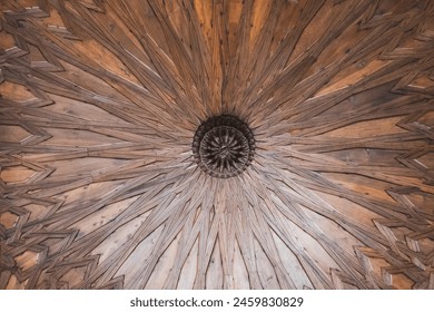 The wood grain of the ceiling is very intricate and detailed. The design is circular and has a lot of small lines and patterns. Scene is one of elegance and sophistication - Powered by Shutterstock