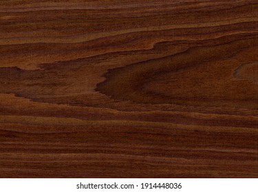 Wood grain texture. Walnut wood, can be used as background.