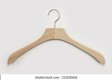 A Wood Hanger On The White Background.