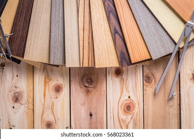 wood laminate veneer material sample for design management and interior construction on wooden floor with free copyspace for your text