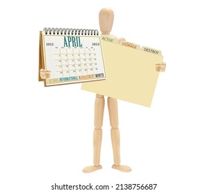 Wood Mannequin Holding Records Informational Management Month April 2022 Calendar And Files (Active, Storage, Destroy) On White Background