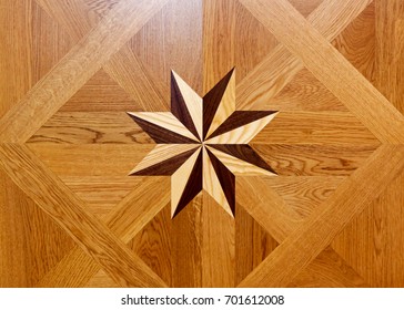 Wood Marquetry Star Shape At Floor Parquet