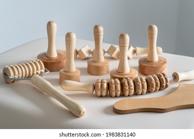 Wood massage maderotherapy madero therapy wooden rolling pin or battledore tools for anti cellulite treatment to stimulate the lymphatic system and improve circulation concept
