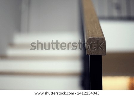 Wood and metal stairs handle rail