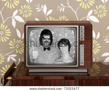 wood old tv nerd silly couple retro man vintage woman on wallpaper [Photo Illustration]